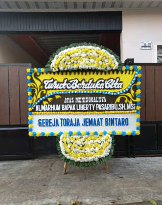 Papan Bunga Duka di Pekapuran Raya